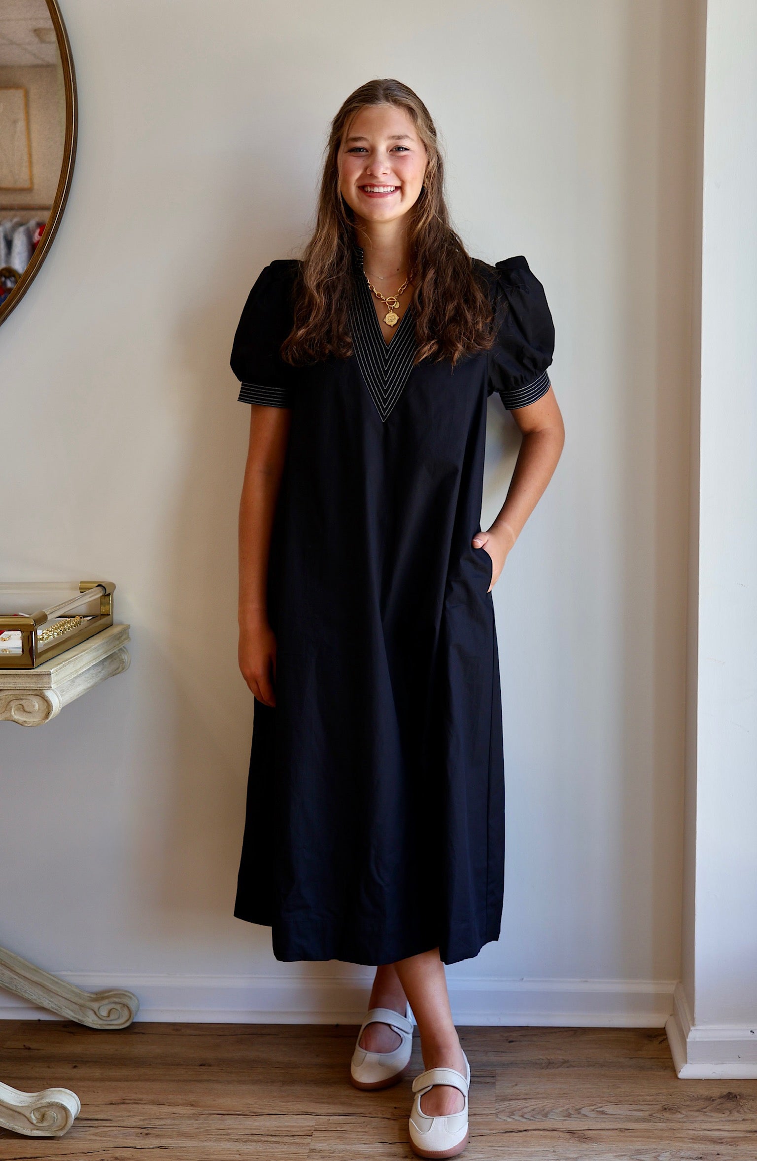 The V-Neck White Stitch Detail Dress in Black