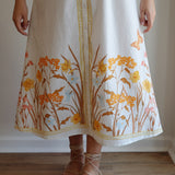 Marigold Hurley in White Flora