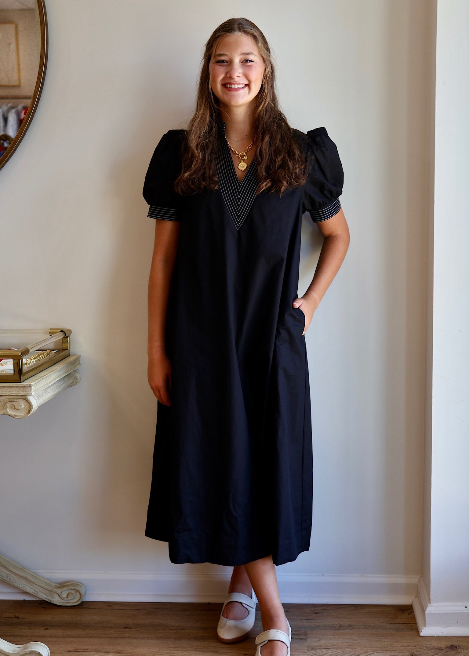 The V-Neck White Stitch Detail Dress in Black
