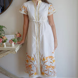 Marigold Hurley in White Flora