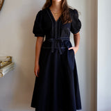 The Puff Sleeve White Stitch Dress in Black