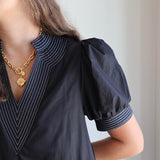 The V-Neck White Stitch Detail Dress in Black