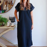 The Black Dress with White Stitching