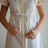 Marigold Hurley in White Flora