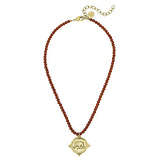 Susan Shaw Gold Elephant on Coral Beaded Necklace